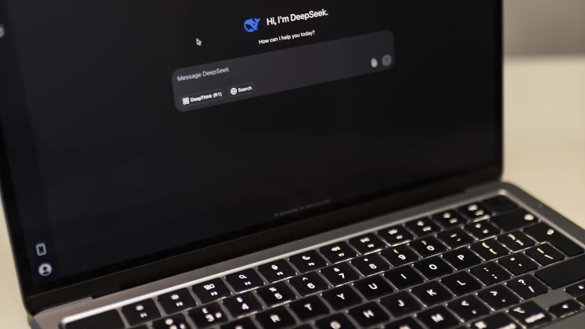 AI writer comparison by use case — Laptop Displaying AI Conversation Interface