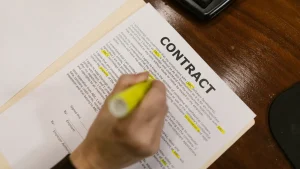 contract document being highlighted on a desk