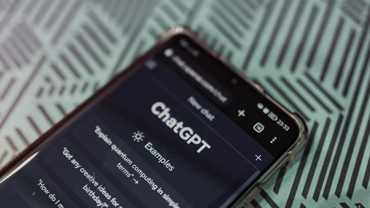 ChatGPT vs Jasper for writing — Smartphone with Chat GPT AI System