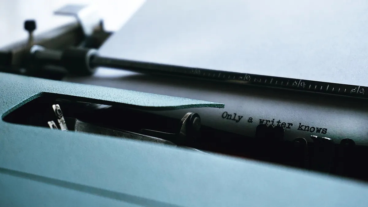 Jasper vs Copy.ai for marketing copy — Close-up Photography of Typewriter With Only a Writer Knows Text on Printer Paper