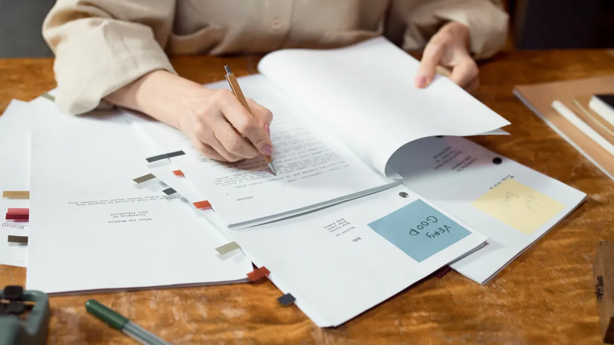 Sudowrite review for fiction writers Sudowrite review for fiction writers — Person Writing on White Paper