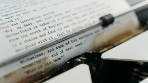 typed manuscript in a typewriter