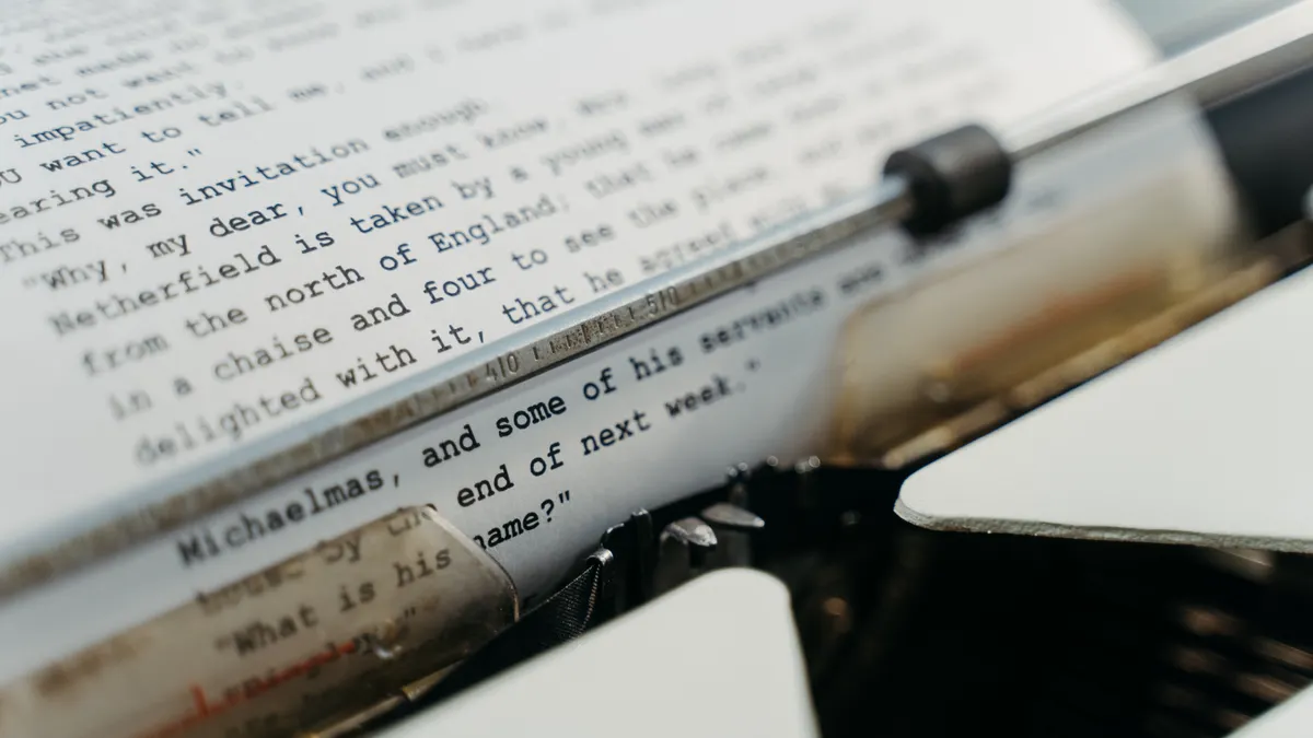 typed manuscript in a typewriter